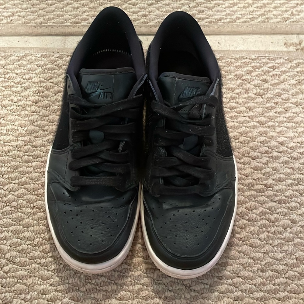 Women’s black Jordan lows